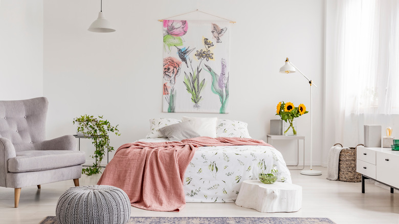 hanging art in a bedroom