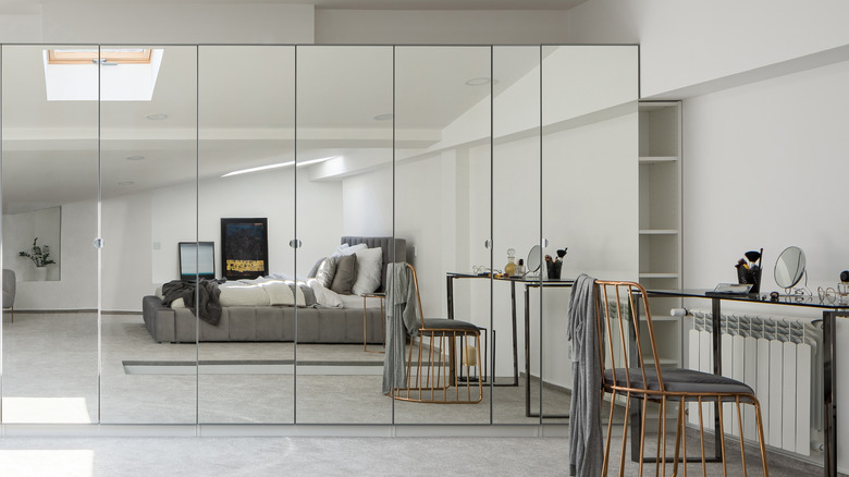 bedroom wall of mirrors