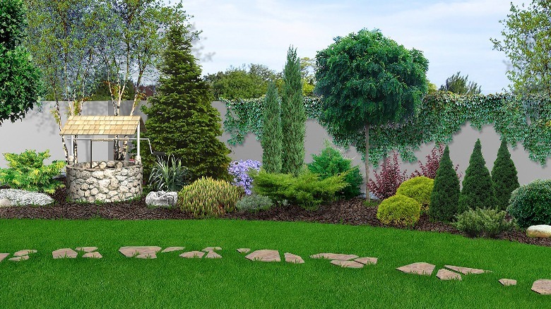 Beautiful backyard with stone well