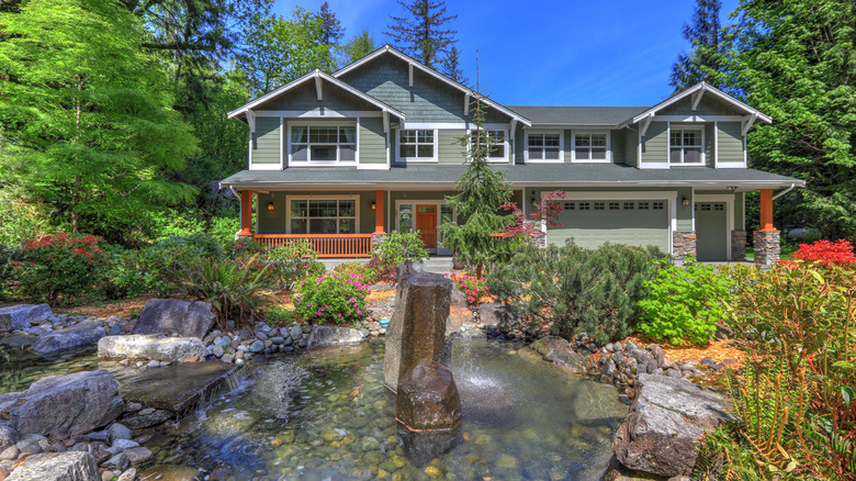 beautiful home with landscaping