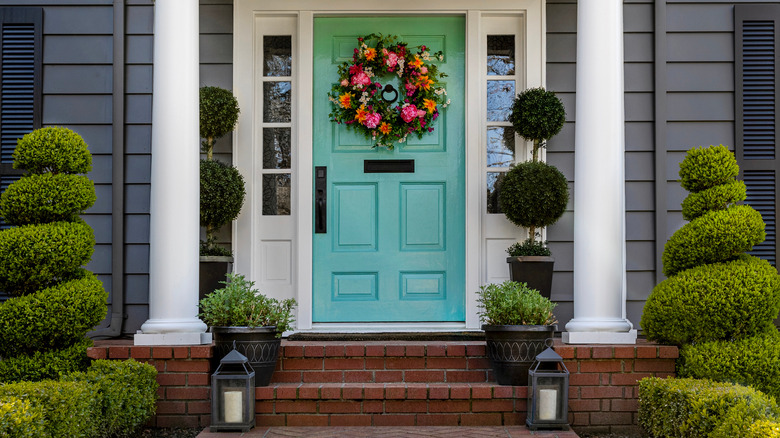 shapely bushes on porch