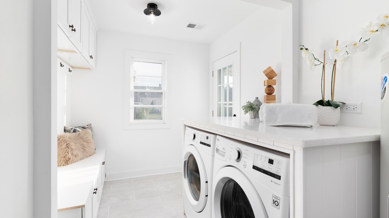 all white laundry room