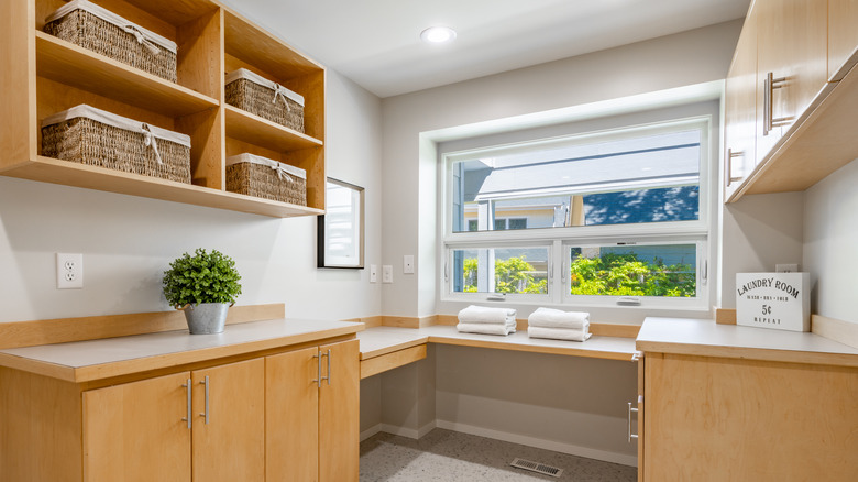 pine cabinets in laundry room