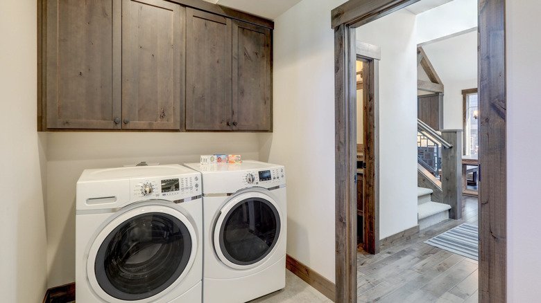 brown cabinets laundry room