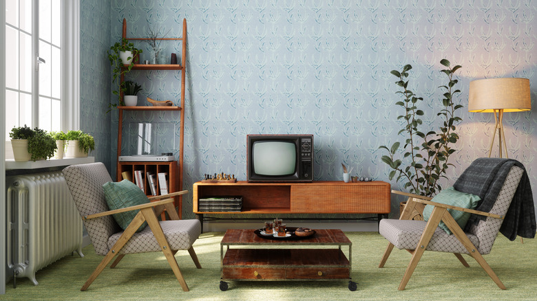 Mixed wood furniture in midcentury living room