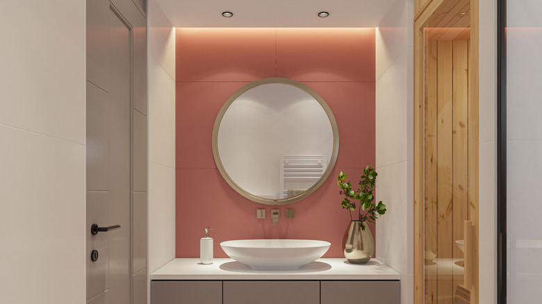 Pink bathroom accent wall