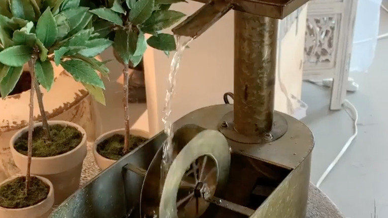 small water feature with wheel