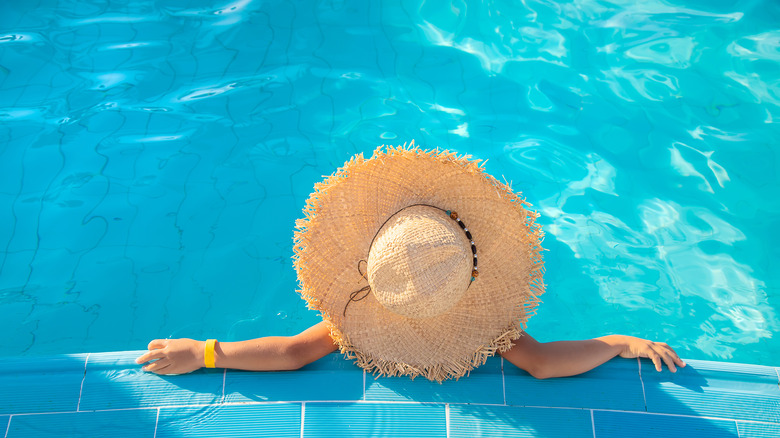 person relaxing in a pool