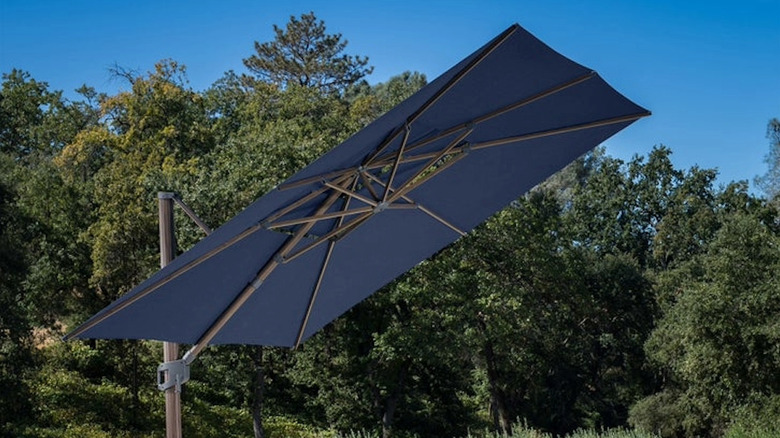 A view of a large canopy umbrella opened up completely.
