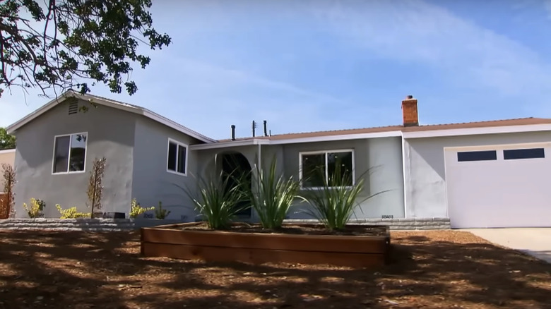 A light gray modern home exterior.