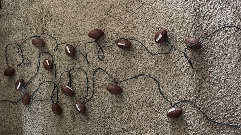 String lights with tiny footballs on them