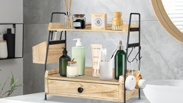 A two-tiered bathroom countertop organizer