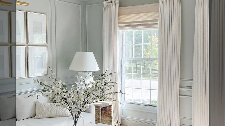 Drapes and Roman shade window treatments