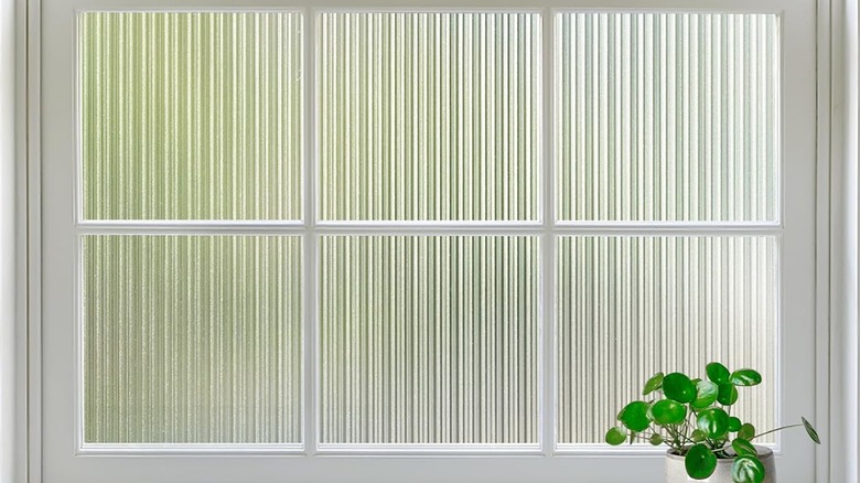 Reeded glass film on a six-pane window