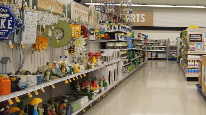 View of a Meijer store's garden, home, and sports section, signs for Sports and Garden on the wall