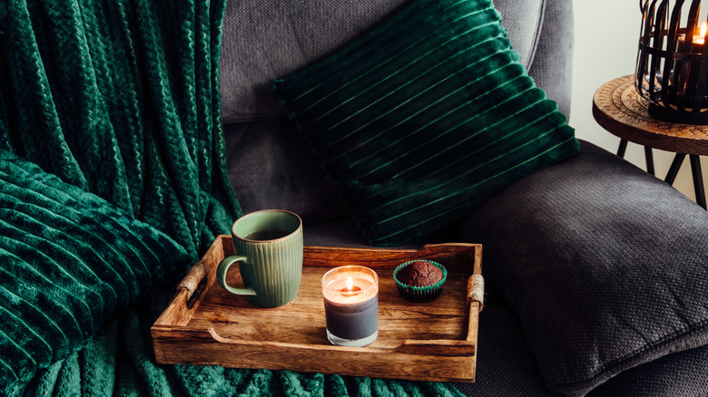 green velvet blanket and pillows