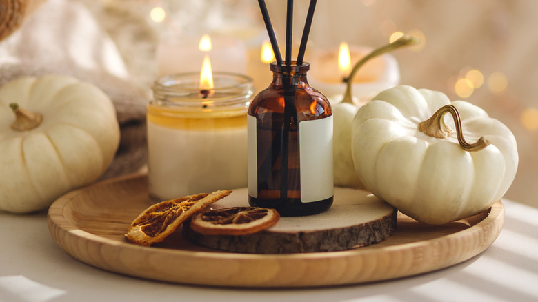 autumn incense on wooden platter