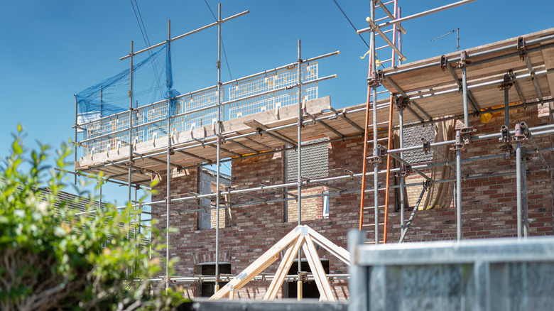 Scaffolding on house adding an extension