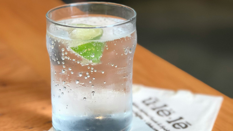 club soda in glass on table
