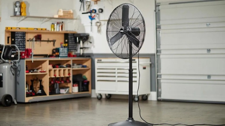 Pedestal fan inside a garage