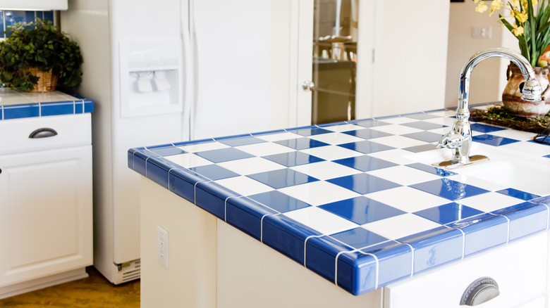 Blue and white checkered porcelain countertop in kitchen
