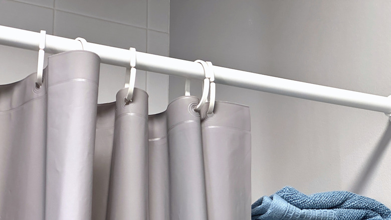 Close up of grey polyester shower curtain