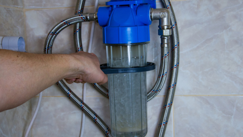 hand installing water softener