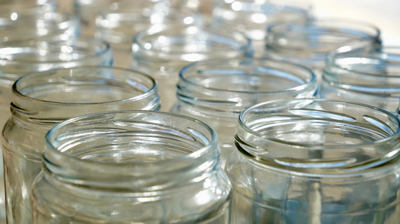 group of empty glass jars