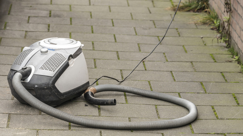 Vacuum outside on a paved path