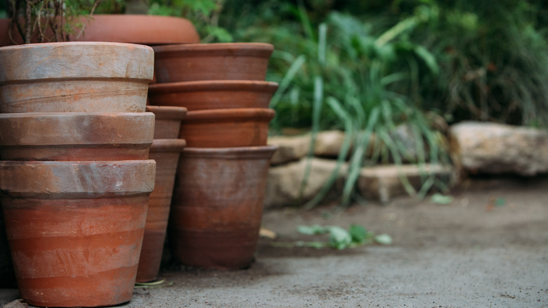 stacked planters in garden