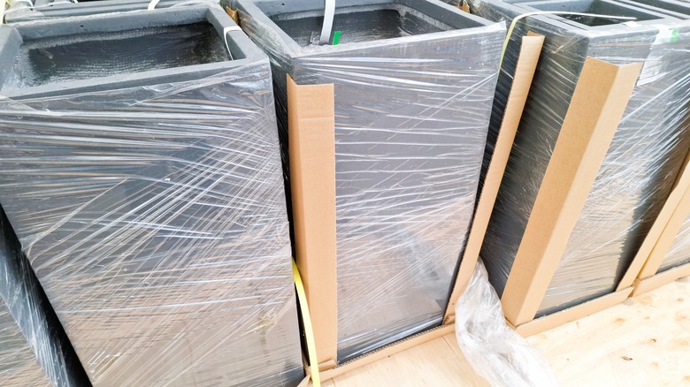 planters wrapped in plastic