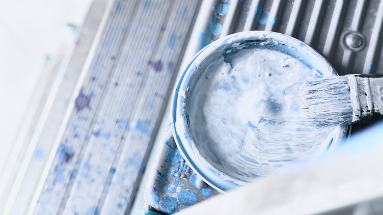 paint bucket and brush