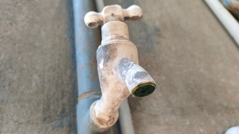 Old, dirty outdoor faucet