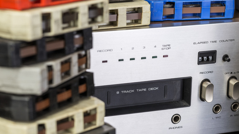 Stacked 8 track tapes with player