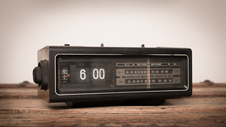 Vintage flip number analog clock radio with alarm