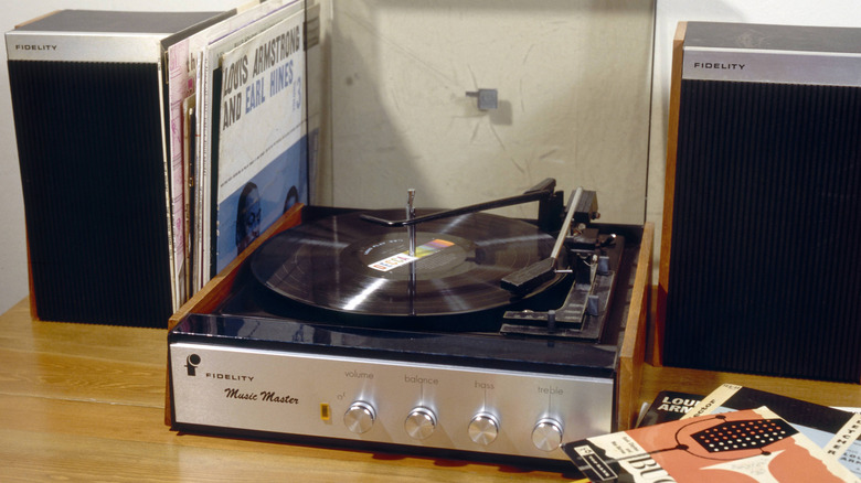 1970s record player with speakers and records