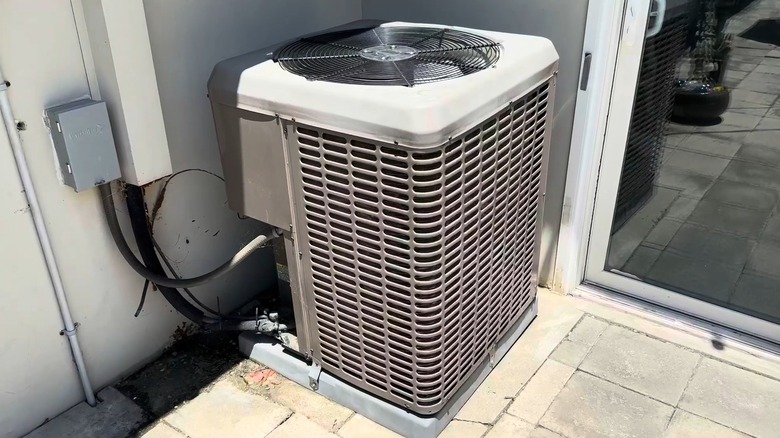 The outdoor unit of a York air conditioner installed outside a home