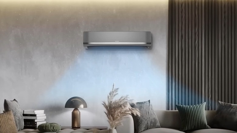 A gray Hitachi AC installed in a modern living room