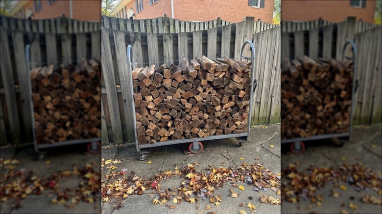 Metal cart holding firewood