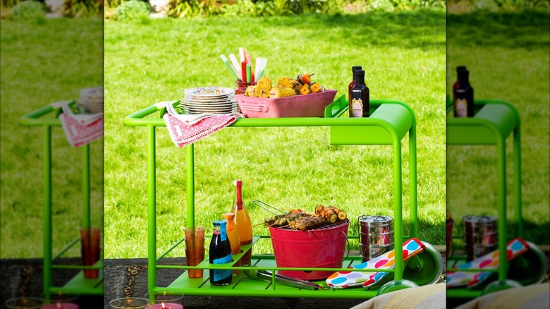 Food and dishes on metal cart
