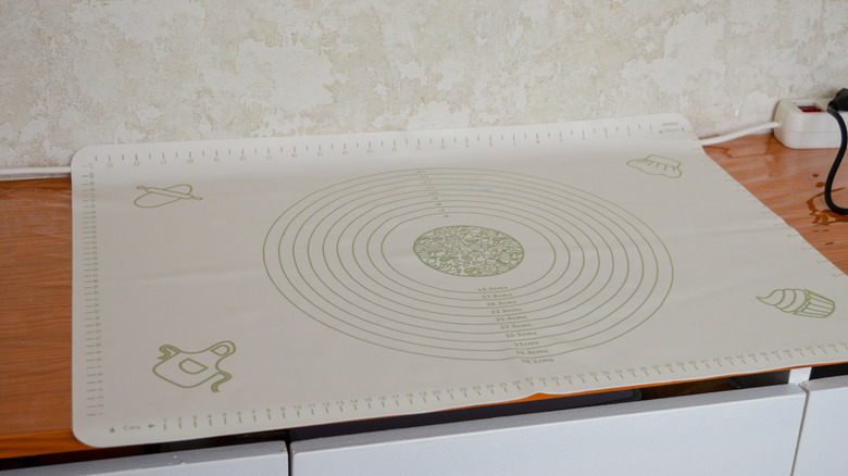 White silicone baking or pastry mat on a wood counter