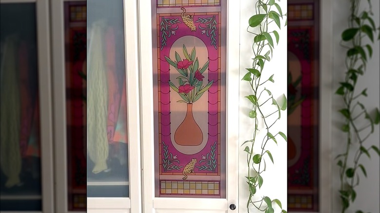 front door of a wardrobe with adhesive film resembling stained glass