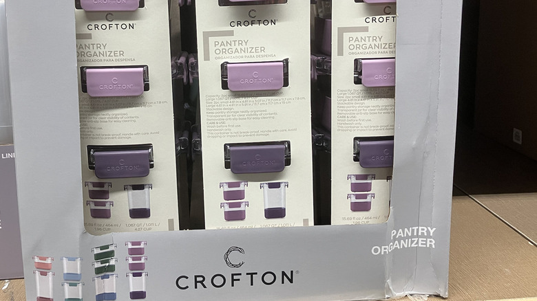 A box of Crofton pantry organizers in purple.