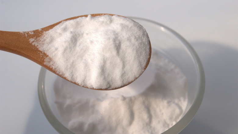Close up of baking soda with a spoon