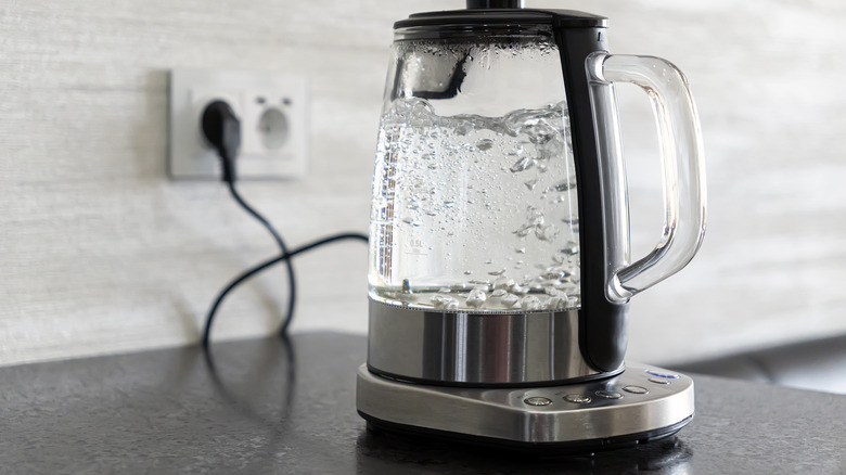 Close up of boiling water in hot water kettle