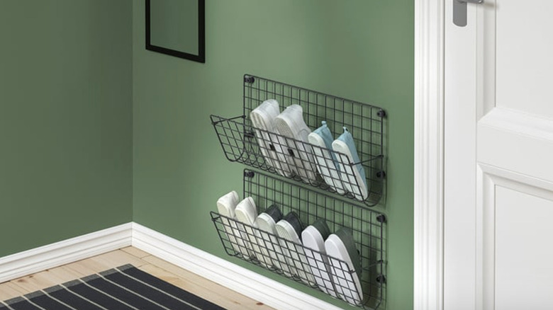 IKEA GREJIG wall pockets holding pairs of shoes