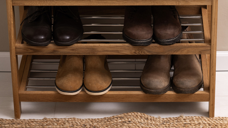 Shoes on a wooden shoe rack