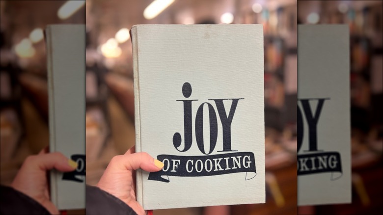 joy of cooking book held up in bookstore