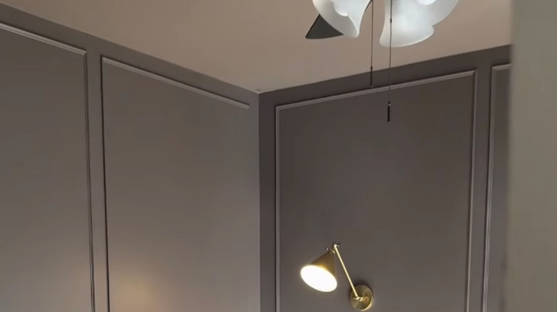 TikTok video showing brown color capping in a bedroom