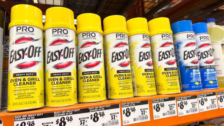 Cans of oven cleaner on a store shelf